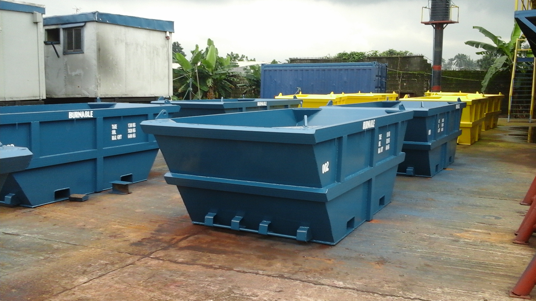painted-waste-skips-yellow-and-blue